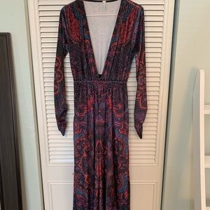 Giselle Velvet Long Sleeve Jumpsuit: FREE PEOPLE. XS. Has clasp.XS fits as Med.